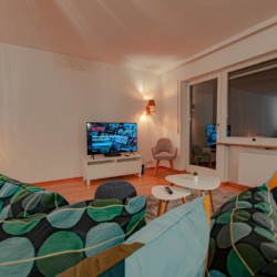 Gemütliche Edle Alpine Suite in Rottach-Egern, stilvoll eingerichtet, ideal für den perfekten Urlaub.