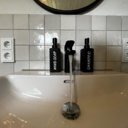 Gemütliches Bad in Bayrischzell Ferienwohnung, moderne Annehmlichkeiten, ideal für Entspannung.
