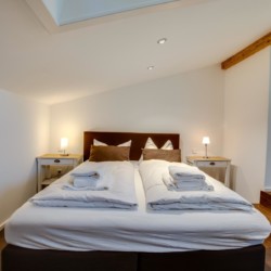 Gemütliches Schlafzimmer in der Villa "Perfall17", Schliersee - ideal für einen entspannten Urlaub. Buchbar bei stayFritz.