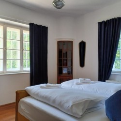 Gemütliches Schlafzimmer in Ferienwohnung "Geitau59 III", Geitau – stayFritz.com.