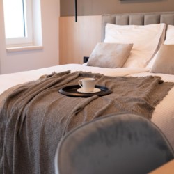 Gemütliches Premium-Apartment in Opatija mit komfortablem Bett und einladendem Ambiente. Ideal für Urlaub.